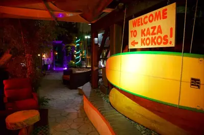 a restaurant with a sign that says welcome to kaza homes at Kaza Kokos in Oceanside