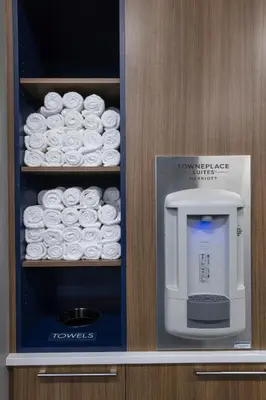 a refrigerator with a coffee maker on a shelf at TownePlace Suites by Marriott San Diego Airport/Liberty Station in San Diego
