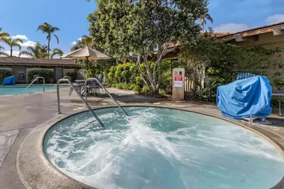 a hot tub in the middle of a swimming pool at Best Western PLUS Island Palms Hotel & Marina in San Diego