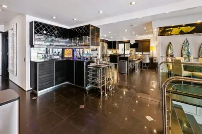 a bar in a restaurant with a counter at 105-Sleekretreat in San Diego