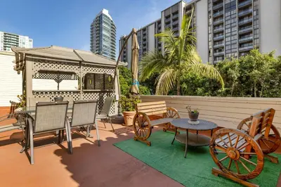 a patio with a gazebo and a table and chairs at Best Western Downtown San Diego in San Diego