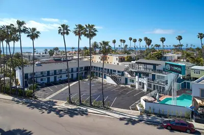 an aerial view of a parking lot with palm trees at The Shoal Hotel La Jolla Beach in San Diego