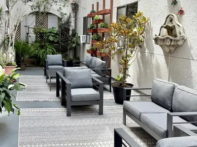 a row of chairs and tables on a patio at Comfort Inn Gaslamp Convention Center in San Diego