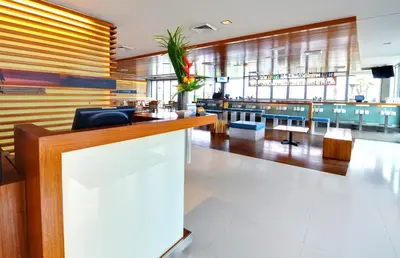 a lobby of a restaurant with a bar at Tower 23 Hotel in San Diego