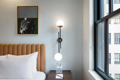 a bedroom with a bed and a window at The Guild Hotel, San Diego Downtown, a Tribute Portfolio Hotel in San Diego