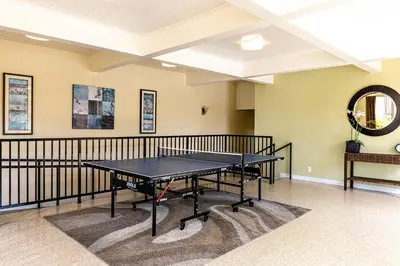 a ping pong room with a ping pong table at Penthouse Condo w/ Panoramic Ocean Views at Beach Resort in Oceanside