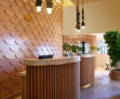 a bar in a restaurant with a wall at San Diego Mission Bay Resort in San Diego