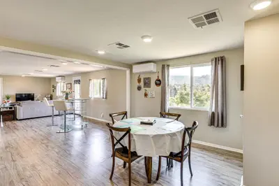a dining room with a table and chairs at Escondido Vineyard Estate Walk to Wineries! in Escondido