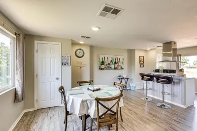 a kitchen and dining room with a table and chairs at Escondido Vineyard Estate Walk to Wineries! in Escondido