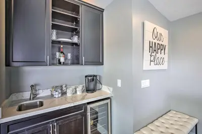 a kitchen with a sink and a counter top at San Diego Home - Walk to Sail Bay and Mission Beach! in San Diego