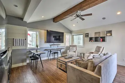 a living room with a couch and a kitchen at San Diego Home - Walk to Sail Bay and Mission Beach! in San Diego