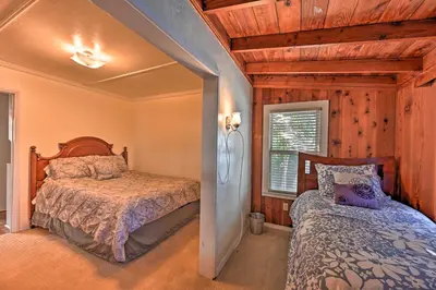 a bedroom with two beds and a window at La Jolla Home and Detached Suite Hot Tub and Backyard in San Diego