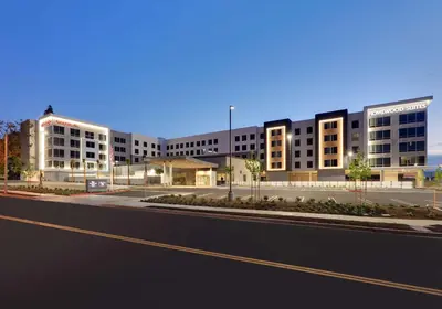 an empty street in front of a large building at Homewood Suites By Hilton Irvine Spectrum Lake Forest in Lake Forest