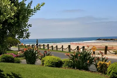 a park with a beach and the ocean in the background at F9 - Beach Cottage Getaway in Oceanside