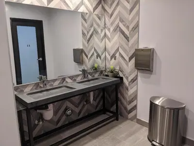 a bathroom with a sink and a mirror at Stay Classy in San Diego