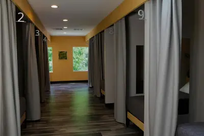 a corridor with curtains in a room at Stay Classy in San Diego
