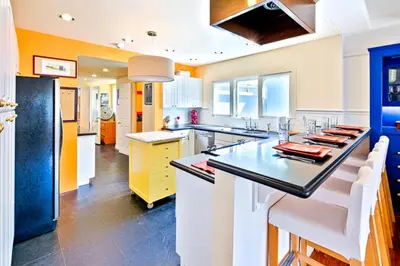 a kitchen with a large island in the middle at Casa Dolce in San Diego