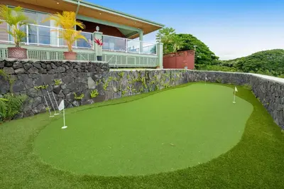 a golf course in front of a house at ENC-183 - SeaBluffe Escape in Encinitas