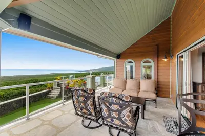 a patio with a table and chairs on a balcony at ENC-183 - SeaBluffe Escape in Encinitas