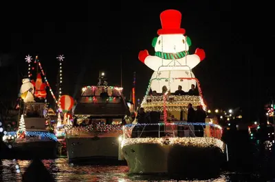 a group of boats with christmas lights on them at 201 Amethyst Avenue in Newport Beach
