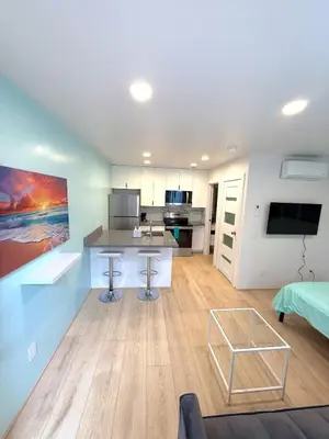 a room with a kitchen and a living room at Casita San Diego in San Diego