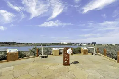 a view of a body of water with a clock at 1000#5 Premier Modern Home w View, Parking, and AC in Newport Beach