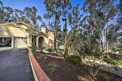 a house with a garage and a driveway at Spacious El Cajon Villa - 14 Mi to Downtown! in El Cajon