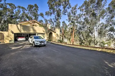 a car parked in front of a house at Spacious El Cajon Villa - 14 Mi to Downtown! in El Cajon