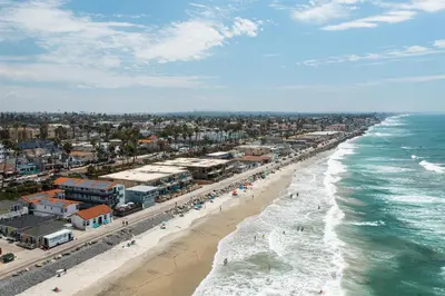 an aerial view of a beach and the ocean at The Marbella in Oceanside