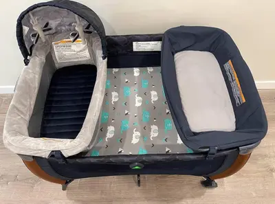 an open suitcase with a dog pattern on it at Luxurious Furnished Studio w Full Kitchen in SD in San Diego