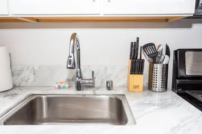 a kitchen counter with a sink in a kitchen at 2 Bedroom, 2 Bathroom Detached Apt Max 7 Sleepers in San Diego