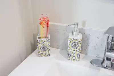three vases sitting on a counter in a kitchen at Prime Location - Awesome View -1 bedroom Apartment in San Diego