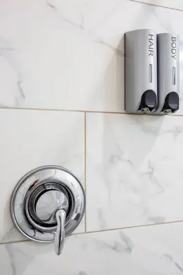 a water hose in a bathroom with a wall at Prime Location - Awesome View -1 bedroom Apartment in San Diego