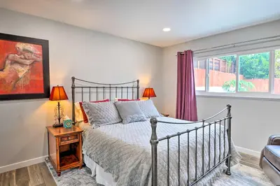 a bedroom with a bed and a window at San Marcos Home with Patio and Grill - Walk to Lake! in San Marcos