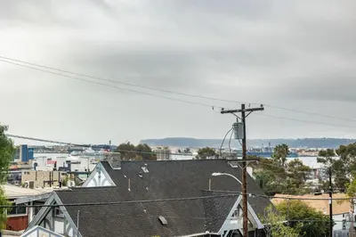 an overhead view of a city with roofs at Big Studio with Ocean View max 6 sleepers in San Diego