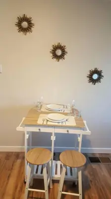a table with two chairs and two mirrors on the wall at Special Studio in Center of San Diego in San Diego