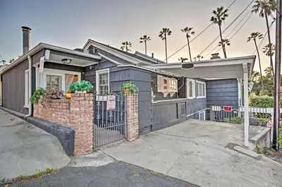 a house with a gate and a fence at Quaint La Mesa Home with Beautiful Sunsets! in La Mesa