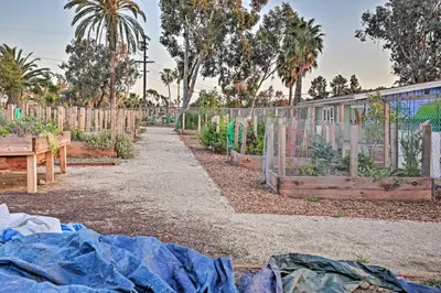 a garden with a fence and some plants at Quaint La Mesa Home with Beautiful Sunsets! in La Mesa