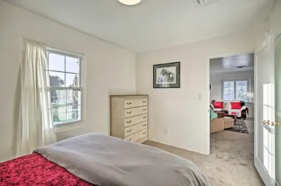 a bedroom with a bed and a dresser at Quaint La Mesa Home with Beautiful Sunsets! in La Mesa