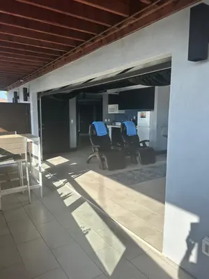 an open patio with chairs and a table in a room at Contemporary Ocean Sunset Views with Firepit Pt Loma close to PLNU in San Diego