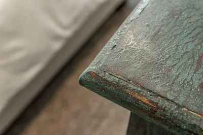 a close up of the edge of a wooden bench at The Rosemont - La Jolla Luxury in San Diego