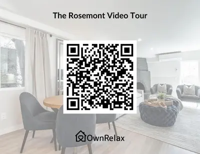 a living room with a qword puzzle on the wall at The Rosemont - La Jolla Luxury in San Diego