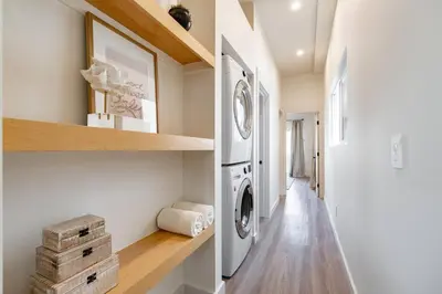 a laundry room with a washer and dryer in a house at The Rosemont II - La Jolla Luxury in San Diego