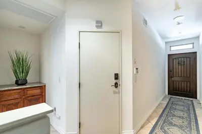 a hallway with a door leading to a bathroom at The San Diego Studio - Free Parking in San Diego