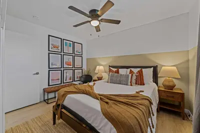 a bedroom with a bed and a ceiling fan at No bad days in San Diego in San Diego