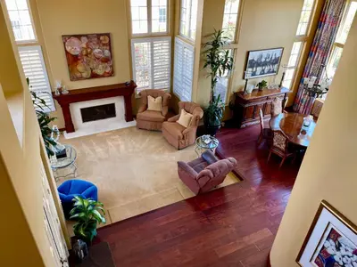 an aerial view of a living room with a fireplace at Rare Newport Coast Home for July & August this Summer in Newport Beach