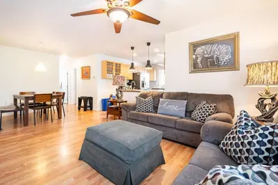 a living room with a couch and a table at Serenity House near Gaslamp, San Diego Zoo & Petco in San Diego