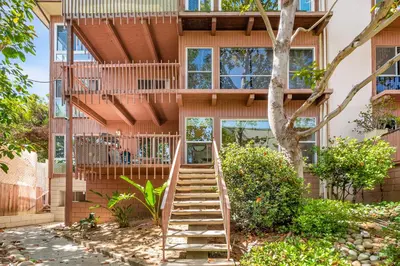 a tree house with a staircase leading up to it at Hideaway Zen in San Diego