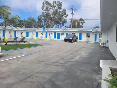 a car parked in front of a building at Calafia Inn San Clemente Newly renovated in San Clemente