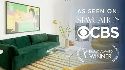 a living room with a green couch and a sign at Avalon 2 Unit Buyout I III AvantStay Mins to GaslampBeautiful Deck w BBQ in San Diego